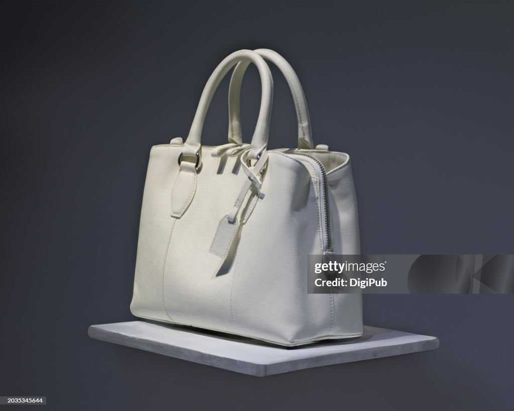 Elegant White Leather Handbag on Display