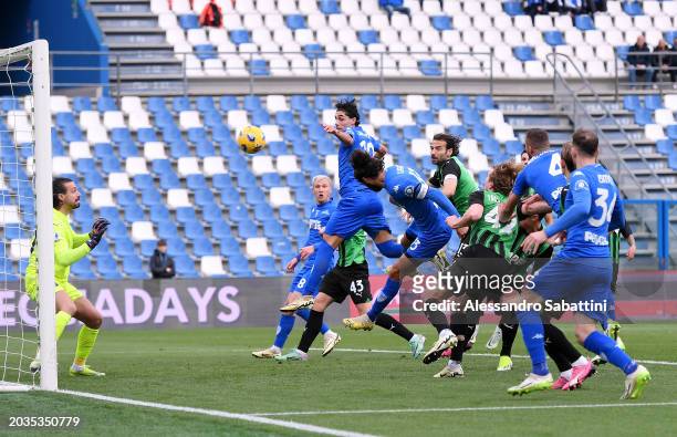 Sebastiano Luperto of Empoli FC scores his team's first goal during the Serie A TIM match between US Sassuolo and Empoli FC at the Mapei Stadium -...