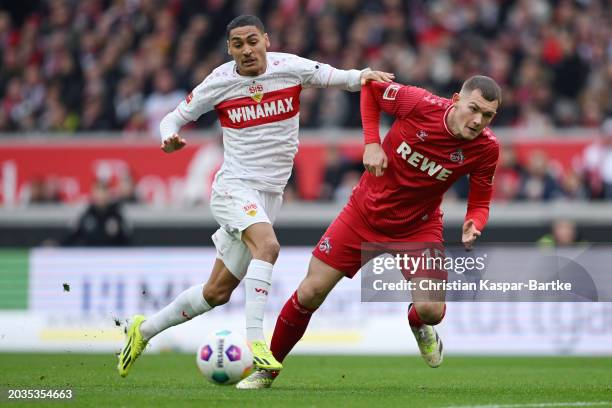 Enzo Millot of VfB Stuttgart is challenged by Luca Kilian of 1.FC Koeln during the Bundesliga match between VfB Stuttgart and 1. FC Köln at MHPArena...