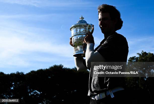 Altin Van Der Merwe of South Africa poses with the trophy following his victory in a playoff during day four of the Africa Amateur Championship and...