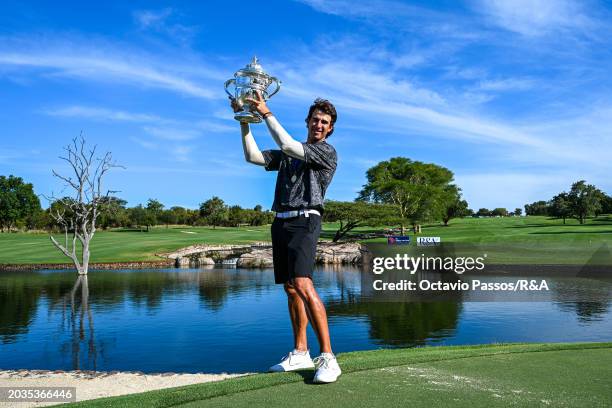 Altin Van Der Merwe of South Africa poses with the trophy following his victory in a playoff during day four of the Africa Amateur Championship and...