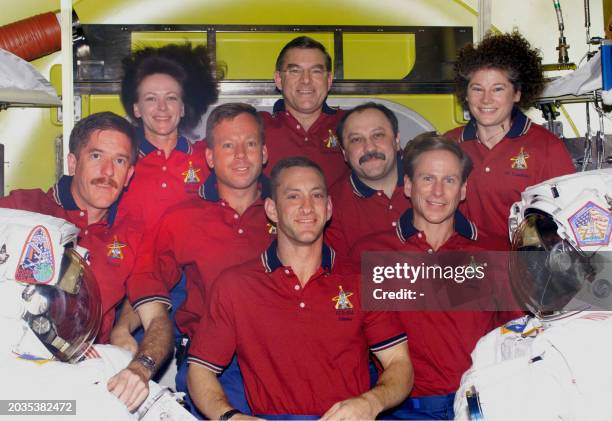 Space shuttle Atlantis crew and the International Space Station Expedition 2 crew US Atlantis Pilot Charles Hobaugh, US Atlantis Mike Gernhardt, US...
