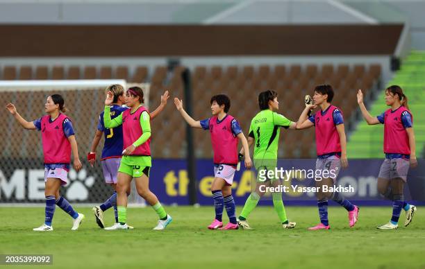 Players of Japan shake hands following the AFC Women's Olympic Football Tournament Paris 2024 Asian Final Qualifier first leg between North Korea and...