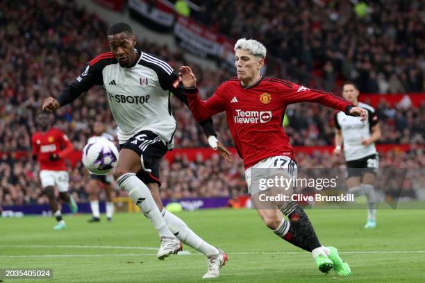 Tosin Adarabioyo of Fulham battles for possession with Alejandro Garnacho of Manchester United during the Premier League match between Manchester...