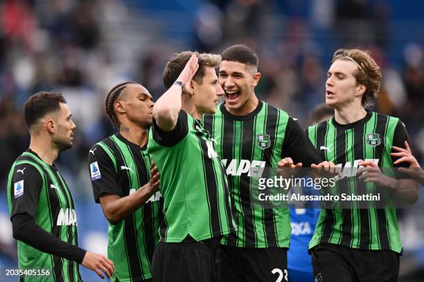 Andrea Pinamonti of US Sassuolo celebrates scoring his team's first goal with team mates during the Serie A TIM match between US Sassuolo and Empoli...