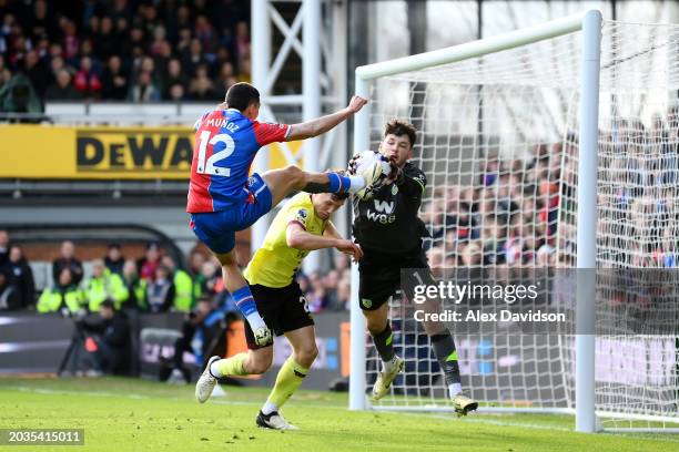 James Trafford of Burnley makes a save against Daniel Munoz of Crystal Palace during the Premier League match between Crystal Palace and Burnley FC...