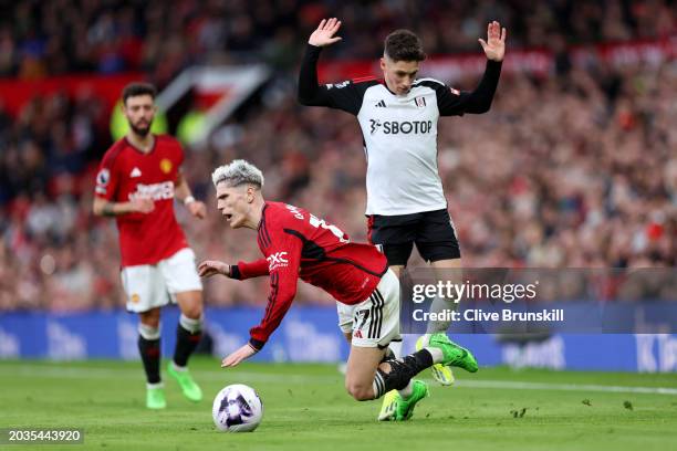 Alejandro Garnacho of Manchester United is fouled by Harry Wilson of Fulham during the Premier League match between Manchester United and Fulham FC...