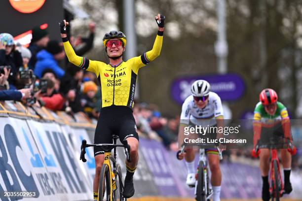 Race winner Marianne Vos of The Netherlands and Team Visma | Lease A Bike celebrates at finish line ahead of Lotte Kopecky of Belgium and Team SD...