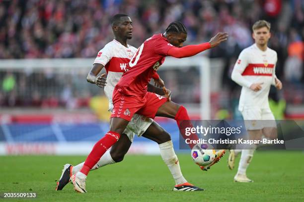 Faride Alidou of 1.FC Koeln is challenged by Serhou Guirassy of VfB Stuttgart during the Bundesliga match between VfB Stuttgart and 1. FC Köln at...