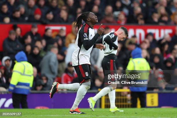 Calvin Bassey of Fulham celebrates scoring his team's first goal during the Premier League match between Manchester United and Fulham FC at Old...