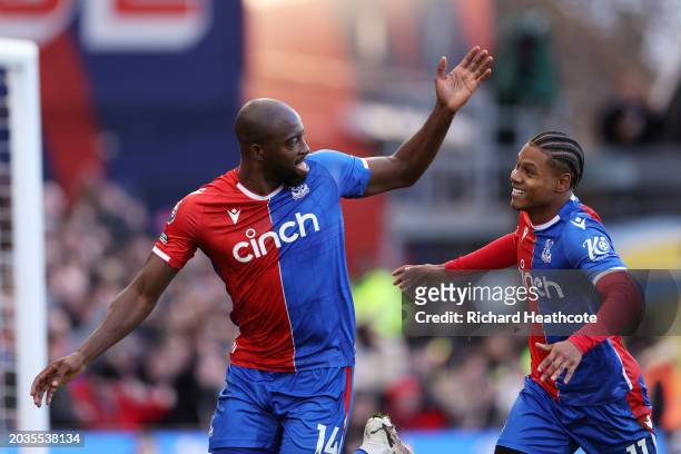Jean-Philippe Mateta of Crystal Palace celebrates scoring his team's third goal from the penalty spot with teammate Matheus França during the Premier...