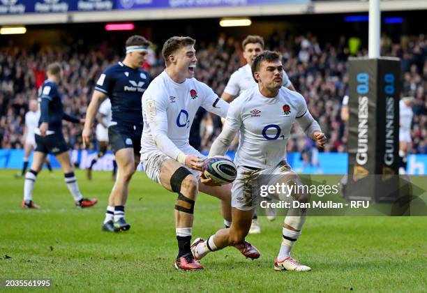 George Furbank of England celebrates scoring his team's first try with teammate Tommy Freeman during the Guinness Six Nations 2024 match between...