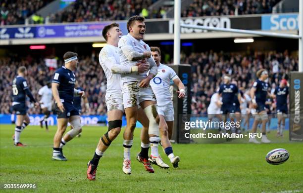 George Furbank of England celebrates scoring his team's first try with teammate Tommy Freeman during the Guinness Six Nations 2024 match between...