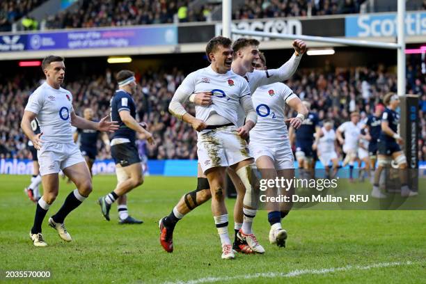 George Furbank of England celebrates scoring his team's first try with teammate Tommy Freeman during the Guinness Six Nations 2024 match between...