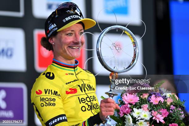 Marianne Vos of The Netherlands and Team Visma | Lease A Bike celebrates at podium as race winner during the 16th Omloop Het Nieuwsblad 2024, Women's...