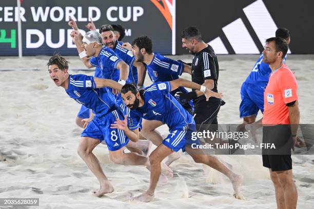 Players of Italy celebrate after winning the FIFA Beach Soccer World Cup UAE 2024 Semi-Final match between Italy and Belarus at Dubai Design District...