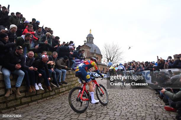 Christophe Laporte of France, Wout Van Aert of Belgium and Team Visma | Lease A Bike and Arnaud De Lie of Belgium and Team Lotto Dstny compete in the...