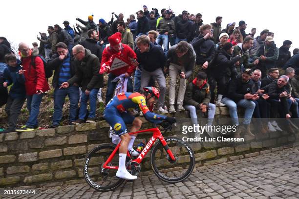 Jasper Stuyven of Belgium and Team Lidl-Trek competes climbing the Muur van Geraardsbergen while fans cheer during the 79th Omloop Het Nieuwsblad...