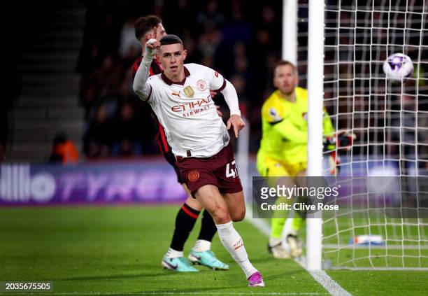 Phil Foden of Manchester City celebrates scoring his team's first goal during the Premier League match between AFC Bournemouth and Manchester City at...