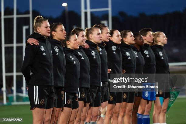 Players of Germany sing the national anthem prior to the U19 Women's Netherlands v U19 Women's Germany - International Friendly on February 24, 2024...