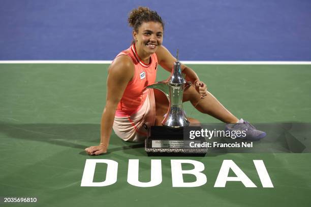 Jasmine Paolini of Italy Anna Kalinskaya poses with her winners trophy after victory against Anna Kalinskaya in their Women's Singles Final match...