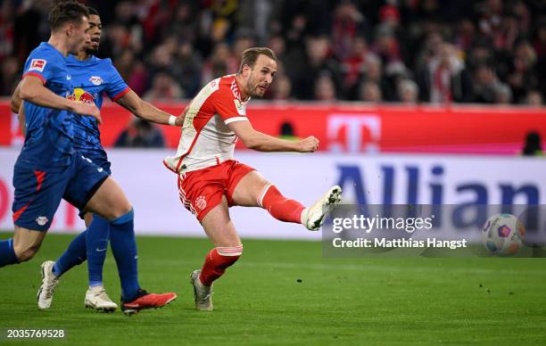 Harry Kane of Bayern Munich scores his team's first goal during the Bundesliga match between FC Bayern München and RB Leipzig at the Allianz Arena on...