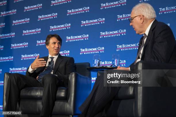 Marc Rowan, chief executive officer of Apollo Global Management LLC, left, and David Rubenstein, co-founder of Carlyle Group Inc., during an Economic...