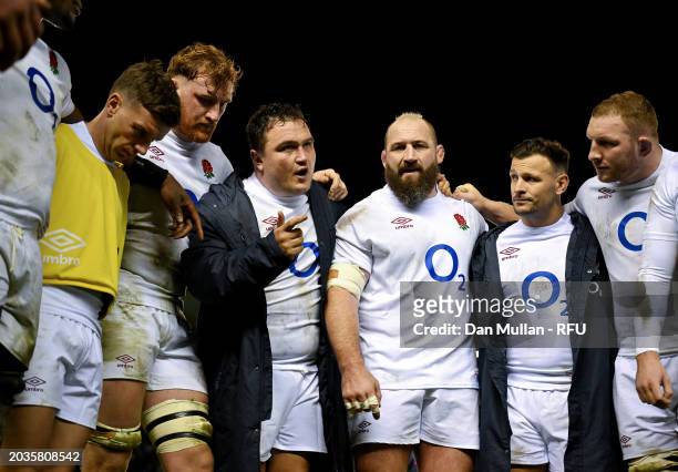 Jamie George of England speaks with teammates as players of England huddle after defeat to Scotland during the Guinness Six Nations 2024 match...