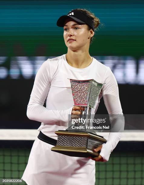 Anna Kalinskaya holds her runner up trophy after the Women's Singles Final match during the Dubai Duty Free Tennis Championships, part of the Hologic...