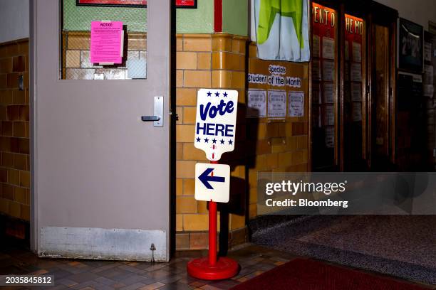 Signage at a polling station at Maples Elementary School in Dearborn, Michigan, US, on Tuesday, Feb. 27, 2024. Tuesday's primary in the crucial swing...