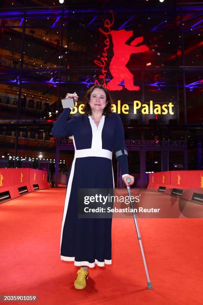 Emily Watson poses with her Silver Bear for Best Supporting Performance in "Small Things Like These" on the red carpet after the Award Ceremony of...