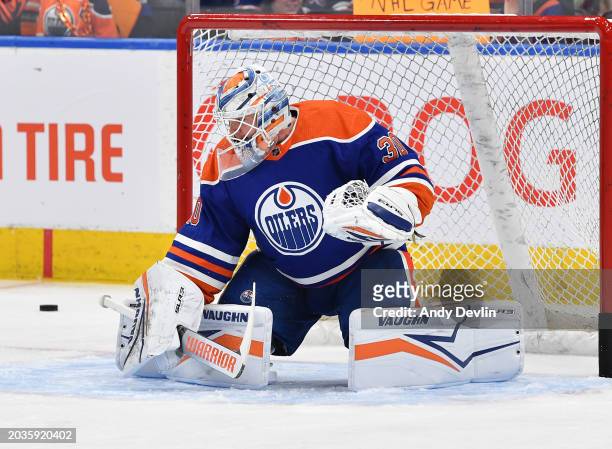 Calvin Pickard of the Edmonton Oilers warms up before the game against the Minnesota Wild at Rogers Place on February 23 in Edmonton, Alberta, Canada.