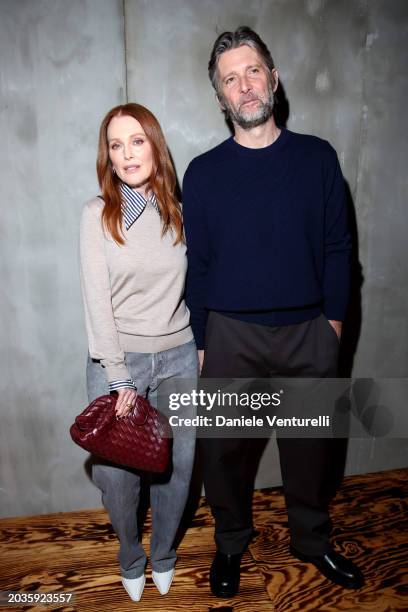 Julianne Moore and Bart Freundlich attend the Bottega Veneta fashion show during the Milan Fashion Week Womenswear Fall/Winter 2024-2025 on February...