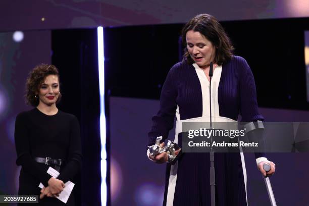 Emily Watson speaks on stage after winning the Silver Bear for Best Supporting Performance in "Small Things Like These" at the Award Ceremony of the...
