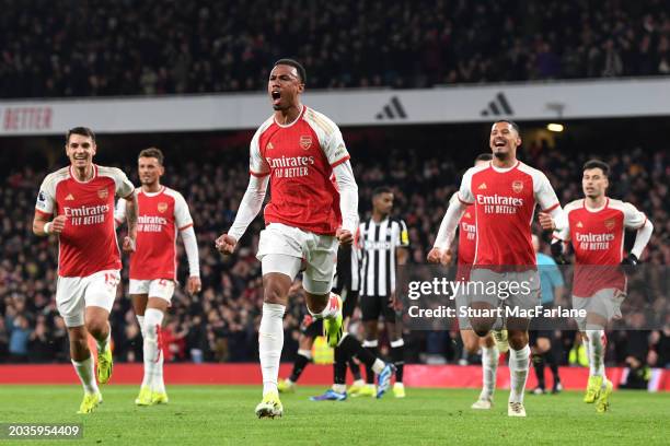 Gabriel of Arsenal celebrates his team's first goal, an own-goal scored by Sven Botman of Newcastle United , during the Premier League match between...