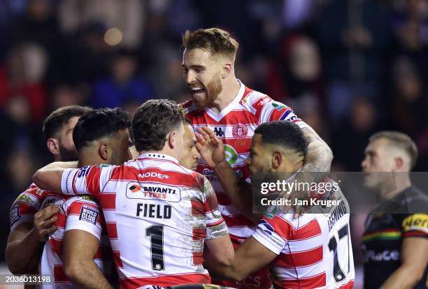 Kruise Leeming of Wigan Warriors celebrates scoring a try during the Betfred Super League Final match between Wigan Warriors v Catalans Dragons at DW...