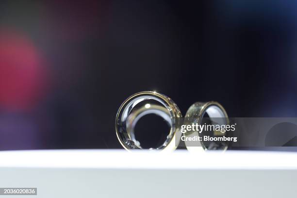 Galaxy smart rings on display at the Samsung Electronics Co. Booth on day two of the Mobile World Congress at the Fira de Barcelona venue in...