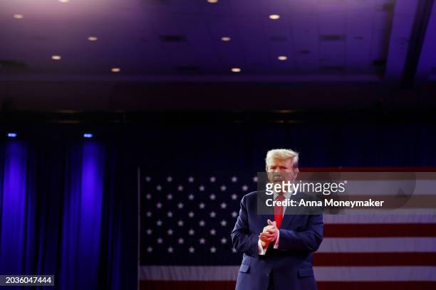 Republican presidential candidate and former U.S. President Donald Trump walks offstage after his remarks at the Conservative Political Action...