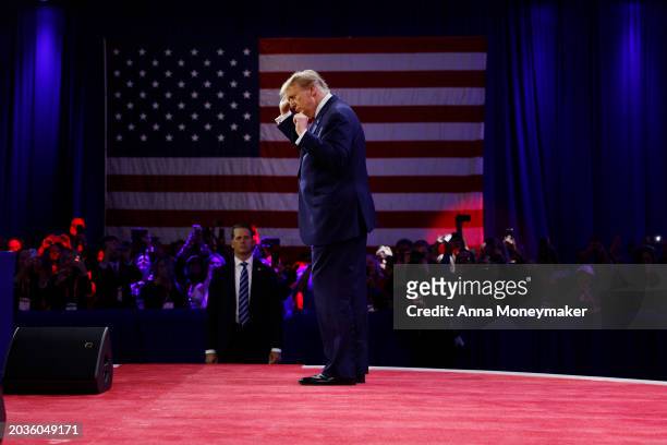 Republican presidential candidate and former U.S. President Donald Trump walks offstage after his remarks at the Conservative Political Action...