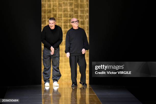 Fashion designers Stefano Gabbana and Domenico Dolce walk the runway during the Dolce & Gabbana Ready to Wear Fall/Winter 2024-2025 fashion show as...