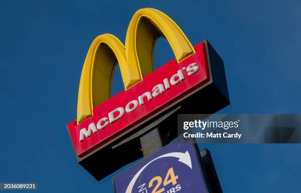 The Golden Arches and Drive Thru logo of the fast food restaurant McDonald's at the Sedgemoor Services on the M5 motorway, on February 25, 2024 in...