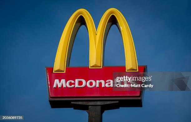 The Golden Arches and Drive Thru logo of the fast food restaurant McDonald's at the Sedgemoor Services on the M5 motorway, on February 25, 2024 in...