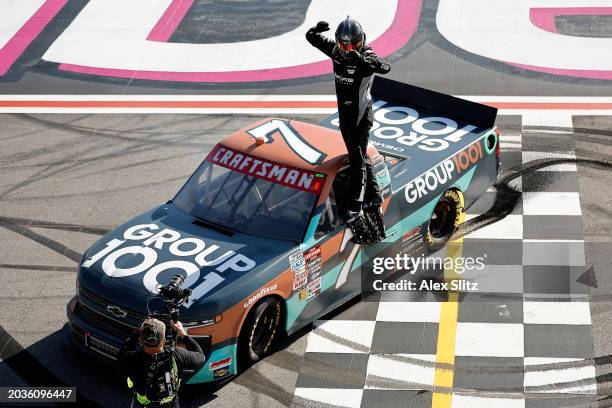 Kyle Busch, driver of the Group 1001 Chevrolet, celebrates after winning the NASCAR Craftsman Truck Series Fr8 208 at Atlanta Motor Speedway on...