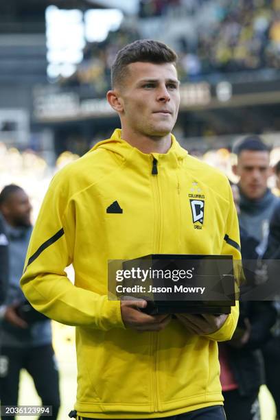 Sean Zawadzki of the Columbus Crewwalks off the pitch with his championship ring before the game against the Atlanta United at Lower.com Field on...