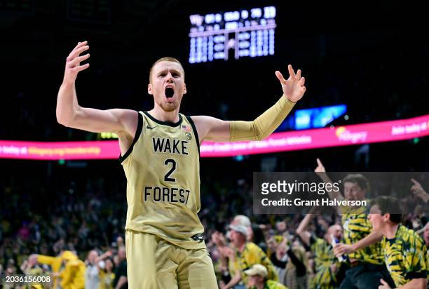 Cameron Hildreth of the Wake Forest Demon Deacons fires up the student section during the final seconds of the game against the Duke Blue Devilsat...