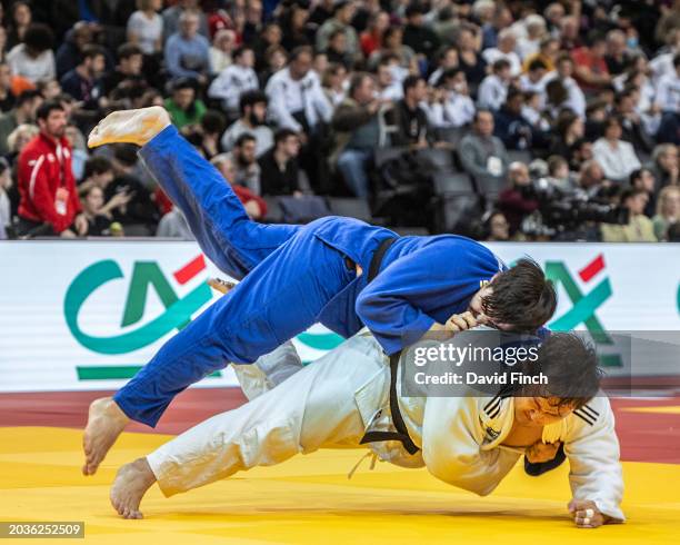 Paris Grand Slam medalist, Jaegu Youn of South Korea throws Francisco Solis of Chile for an ippon to win their o100kg elimination contest during the...