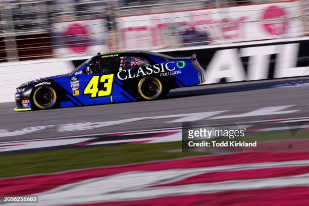 Ryan Ellis, driver of the Classic Collision Chevrolet, drives during the NASCAR Xfinity Series King of Tough 250 at Atlanta Motor Speedway on...