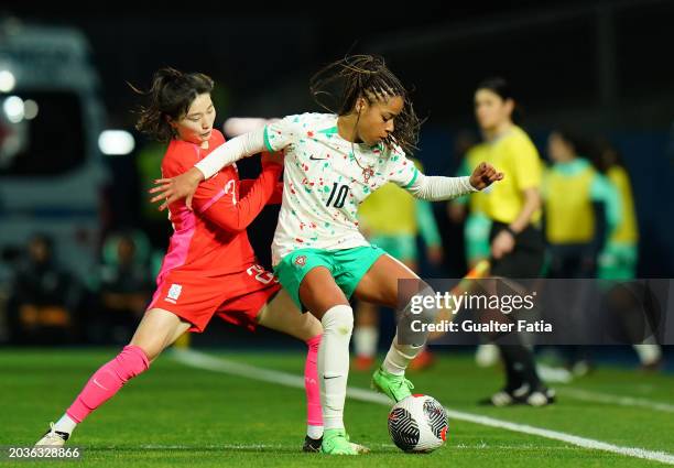 Jessica Silva of Portugal with Kang Chae-rim of South Korea in action during the International Women's Friendly match between Portugal and South...