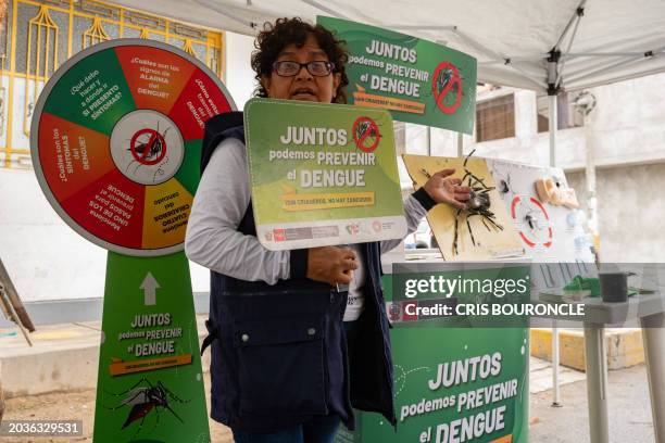 Brigadier of the Peruvian Ministry of Health instructs residents of the populous district of El Agustino on how to avoid and the dangers of Dengue,...