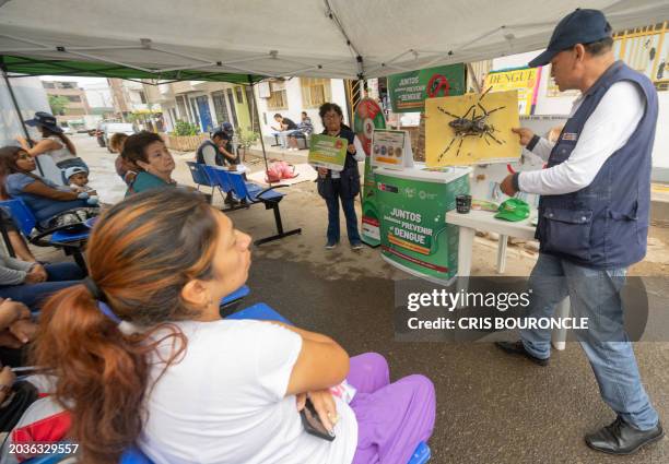 Brigades of the Peruvian Ministry of Health instruct residents of the populous district of El Agustino on how to avoid and the dangers of Dengue, in...